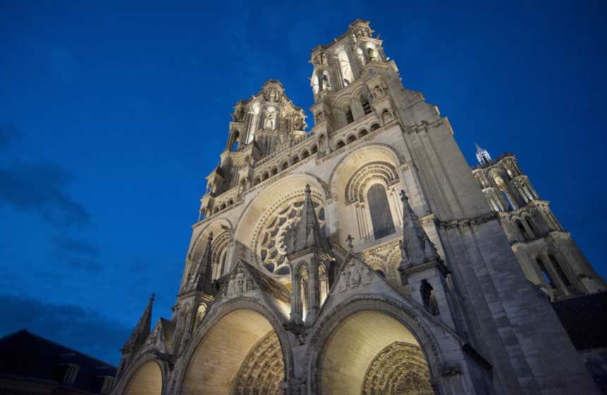 … and as night falls, admire the intricate stonework on the cathedral’s facade
