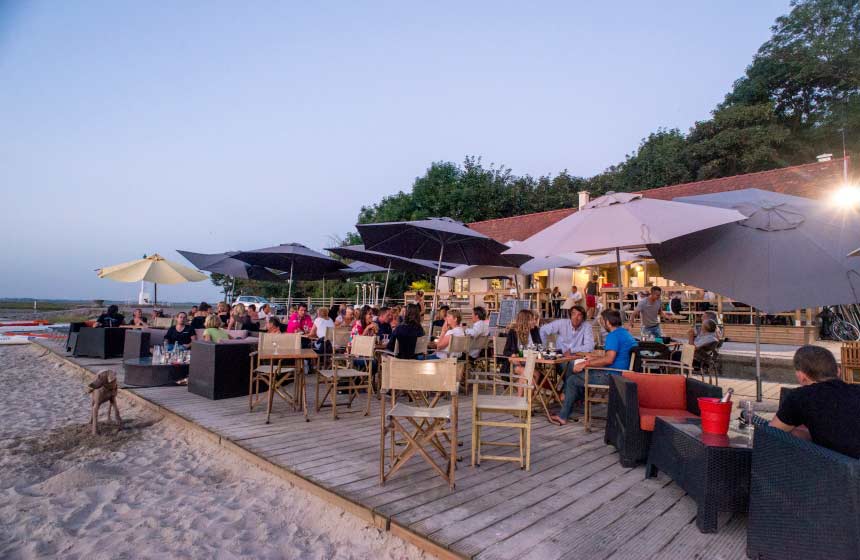 Enjoy a drink with your toes in the sand at 'Buvette de la Plage' in Saint-Valery sur Somme